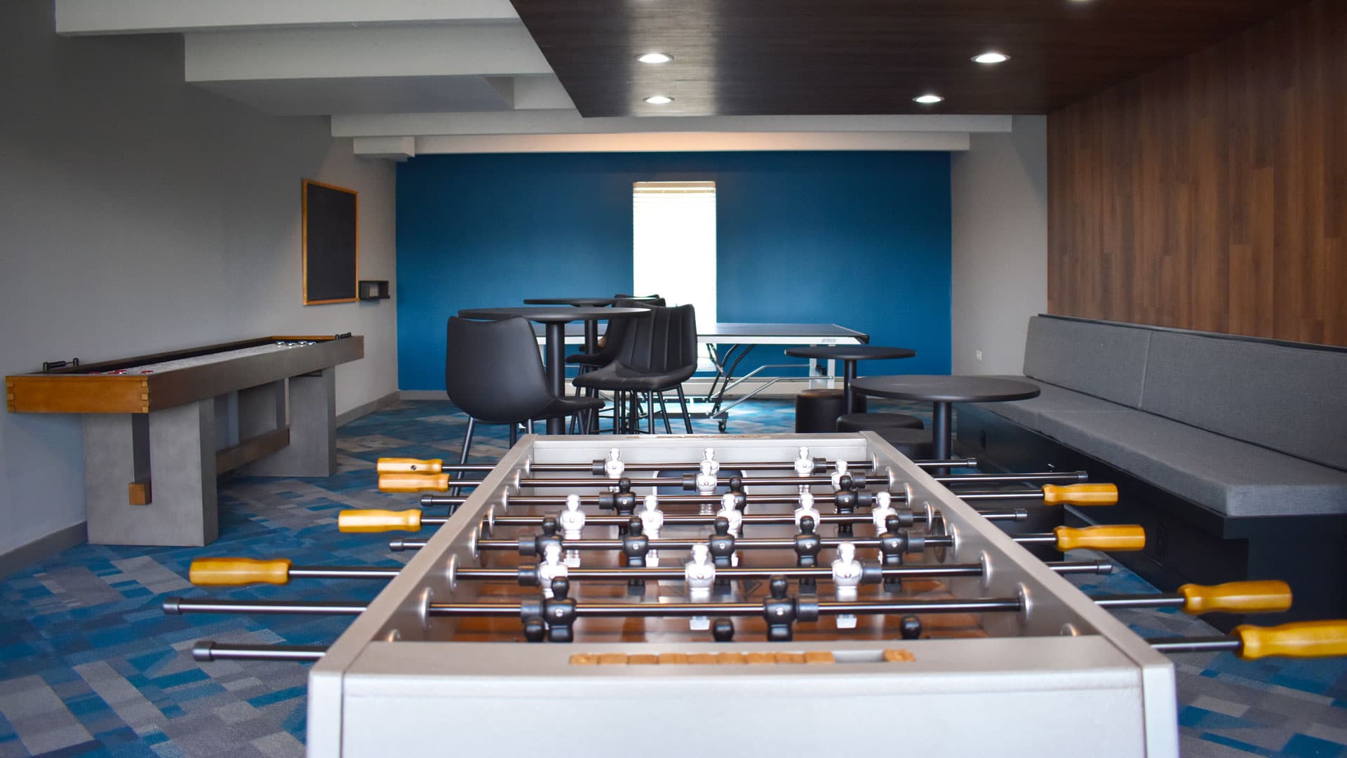 Game room with Foosball table.