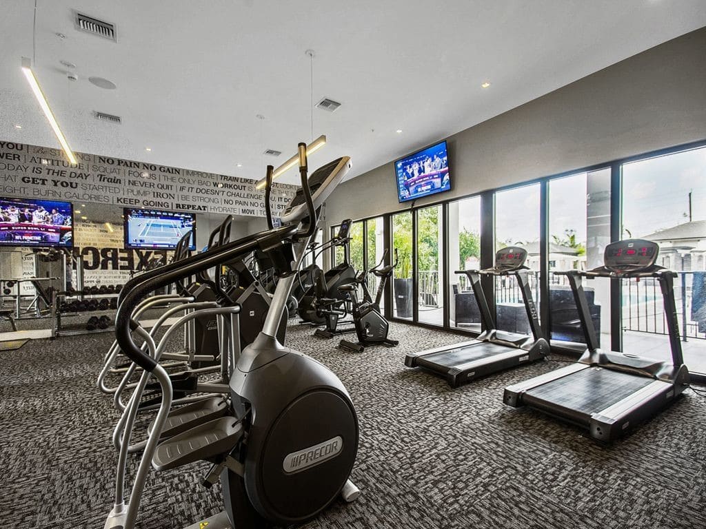 Fitness center with cardio machines.