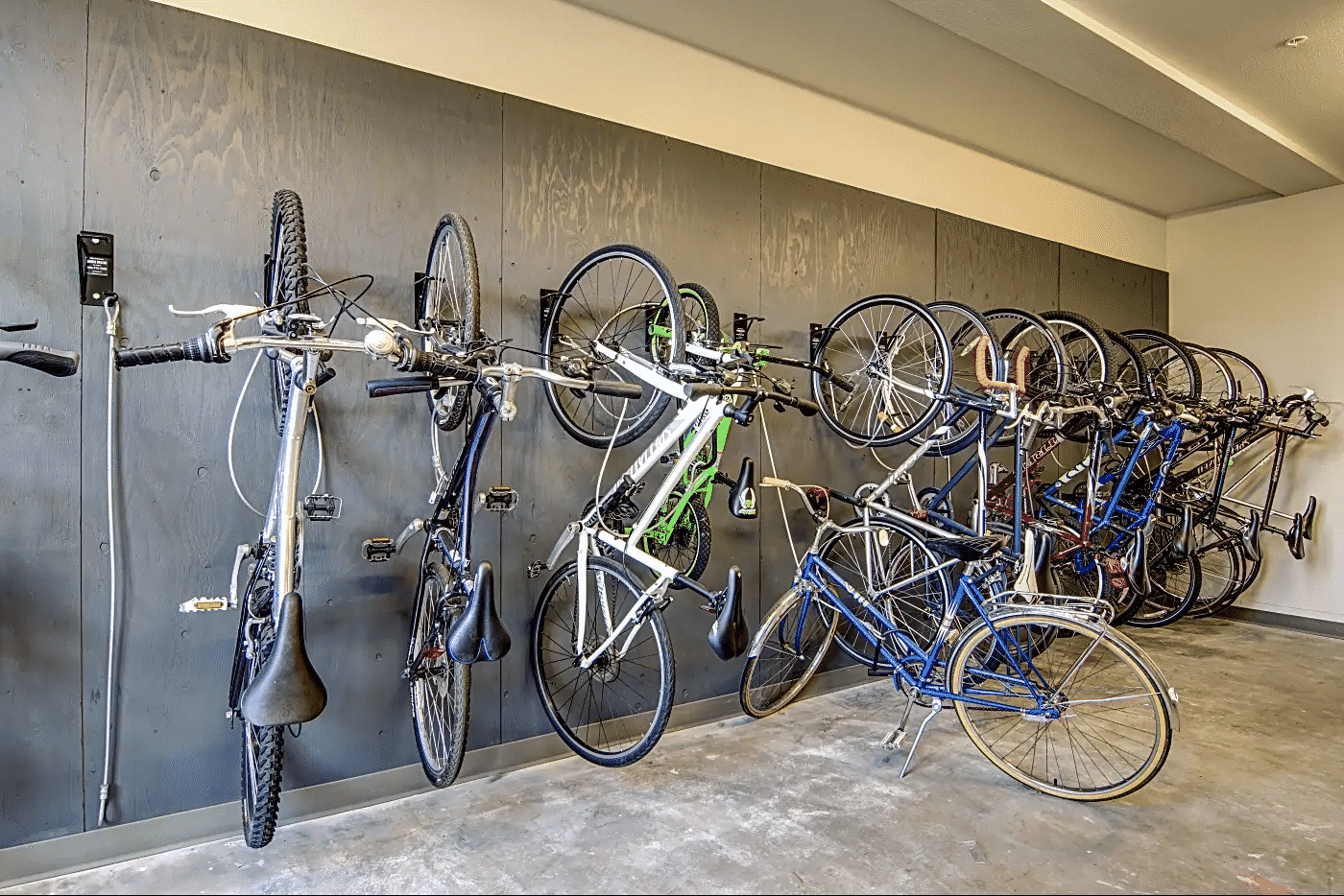 Bicycle storage room with bikes hanging on the wall