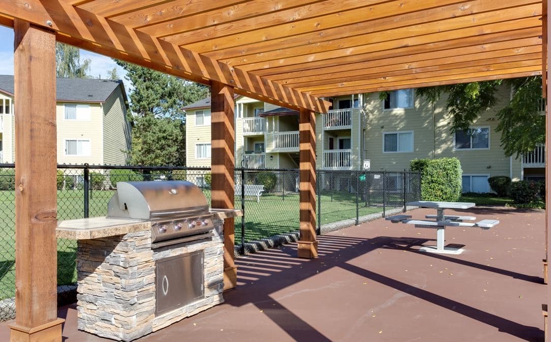 Outdoor BBQ grill and pergola.