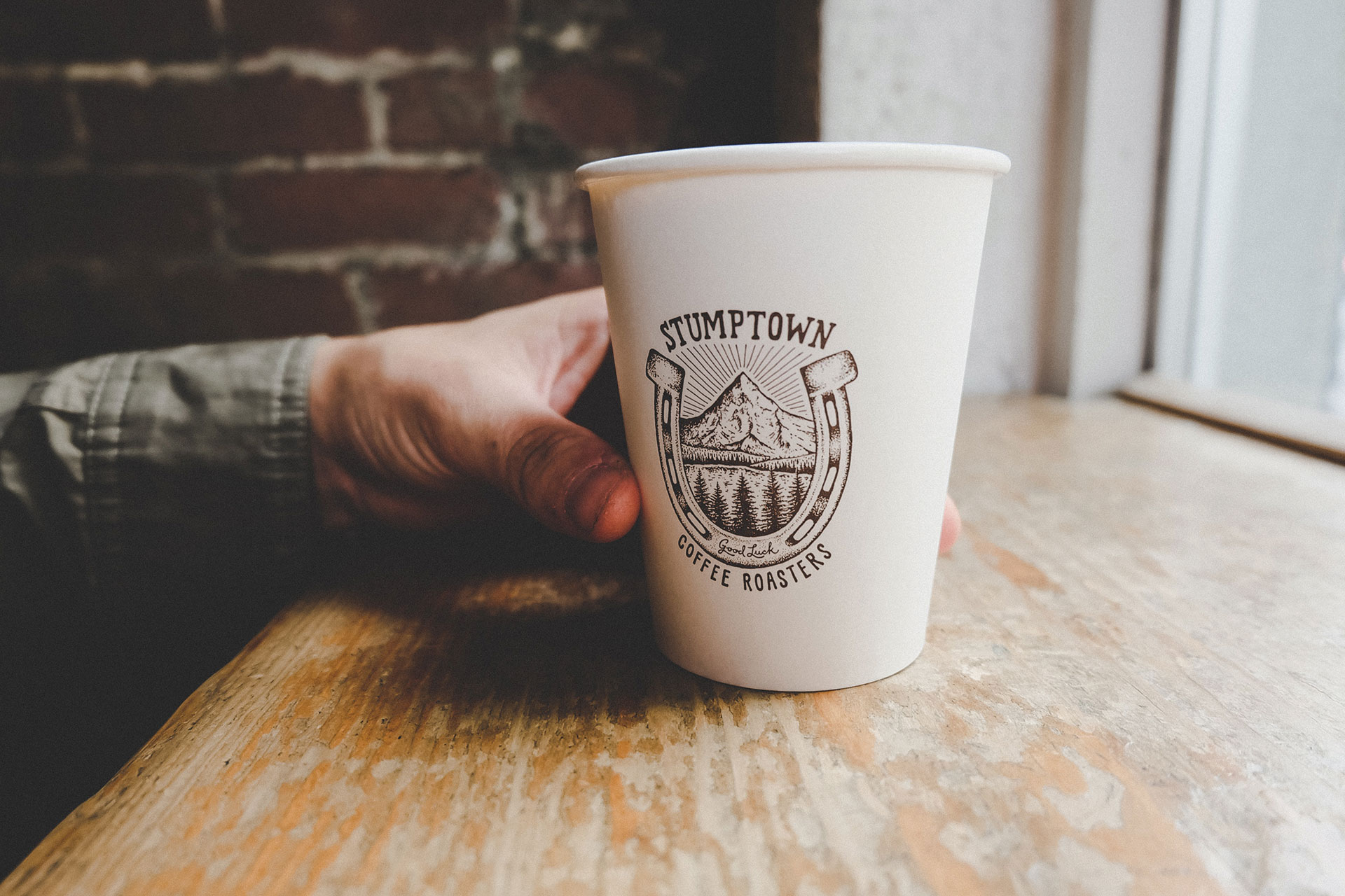 Cup of coffee with Stumptown logo